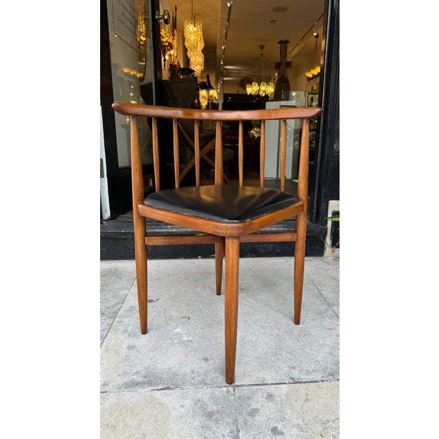 A fabulous set of four bentwood corner chairs in polished oak with black leatherette seats . The chairs have been...