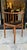 A fabulous set of four bentwood corner chairs in polished oak with black leatherette seats . The chairs have been...