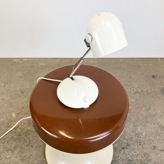 Practical table lamp for bedside tables, desks, or pianos. The lamp head can be extended from 18 cm to 46 cm above the...