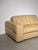 Elegant italian-made two-seater sofa upholstered in soft beige leather. A comfortable, generously proportioned design...