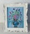 Abstract still life if Floweers in vase on blue background by Elia in ornate reticulated white frame.