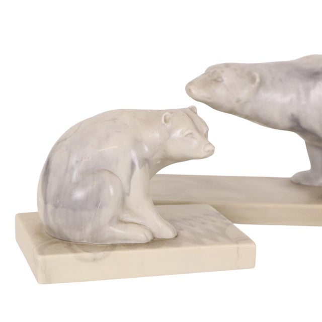 A vintage set of three animal figurines made from cultured marble (or resin colored to resemble marble), based on an...