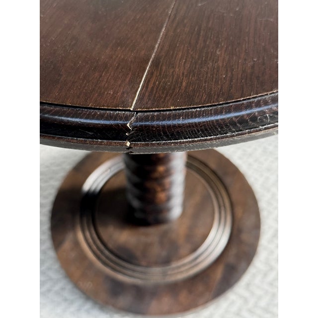 A striking and sculptural late 19th to early 20th-century French industrial side table, beautifully constructed around an...