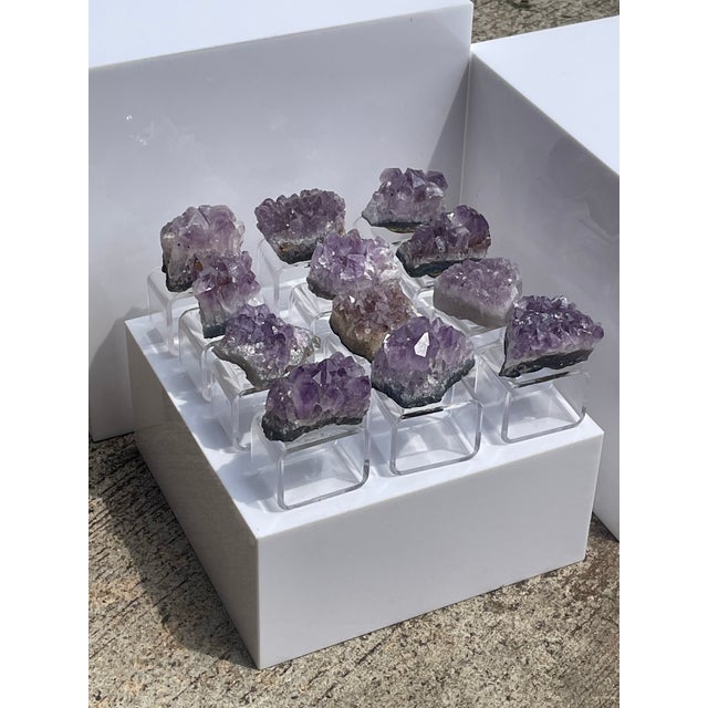 Set of twelve lucite napkin ring holders with Purple Amethyst Crystal Geodes. These are the exact pieces you will receive....