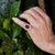 18k Ring with AGL certified 7.98 carat Burma Ruby Cabochon and 18 round diamonds weighing 4.08 carats and 10 baguette...