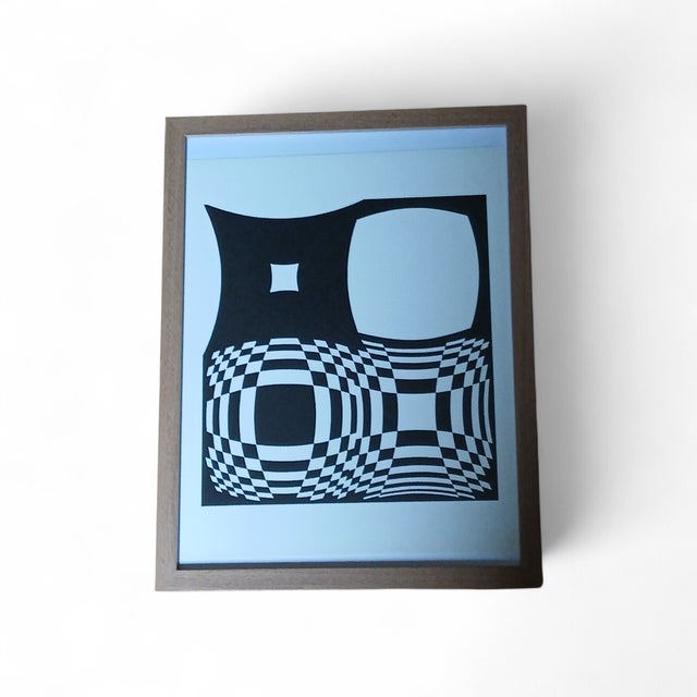 The radical elegance of black and white for a masterpiece of Kinetic Art. The Object: Authentic vintage print (high-...