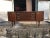 Designed by E Gomme and made by G Plan. The sideboard has three drawers in the middle next to cupboard doors. I have...