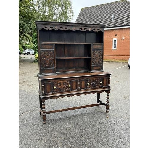 Oak Dresser By Denby & Spinks Of Leeds, Circa 1930's. Sizes :- 181 cms tall, 145.5 cms wide, 45 cms depth. Top lifts off...