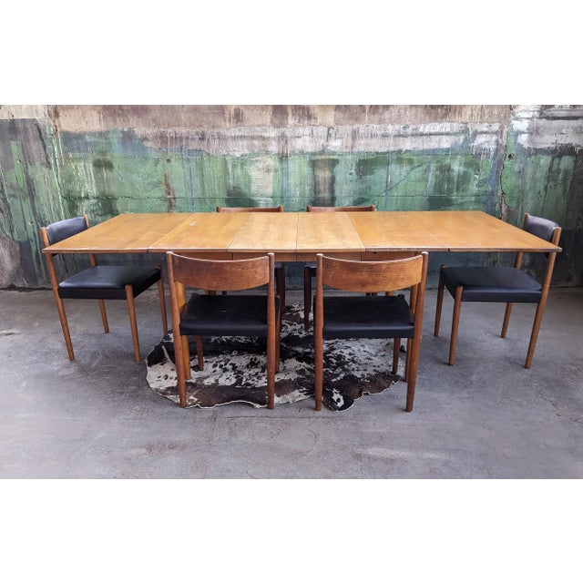 Absolutely awesome RARE Leslie Diamond Conant Ball dining table complete with all original leaves to the set! The table...