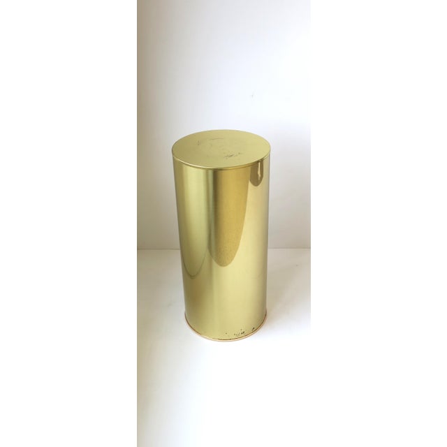 A collectable brass plated pedestal column stand signed by designers C. Jere, '70s Modern Post-Modern period, circa 1970s,...