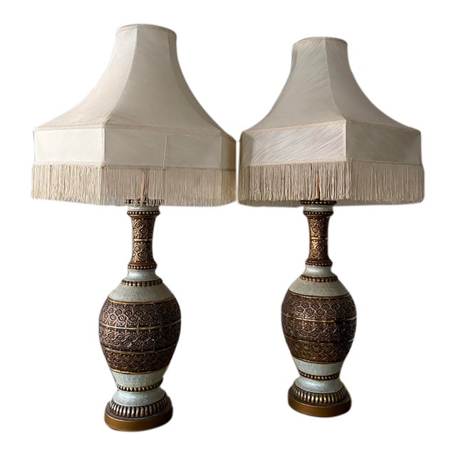 Vintage 1970s Hollywood Regency Chunky Gold Filigree Table Lamps With Fringed Shades - A Pair For Sale