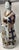 Modeled in draped robes, embellished with fenced rabbits. Signed by artist inside base.