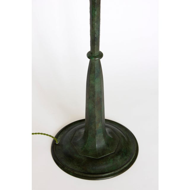 Important bronze floor-lamp by Philippe Genet (born 1882) and Lucien Michon. 210 cm height with shade. France, circa 1940...