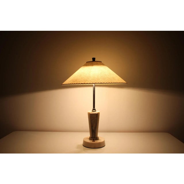 Good condition. New handmade shade made of parchment paper. Cisteno. Made of marble and metal. Marked. Up to 250V...