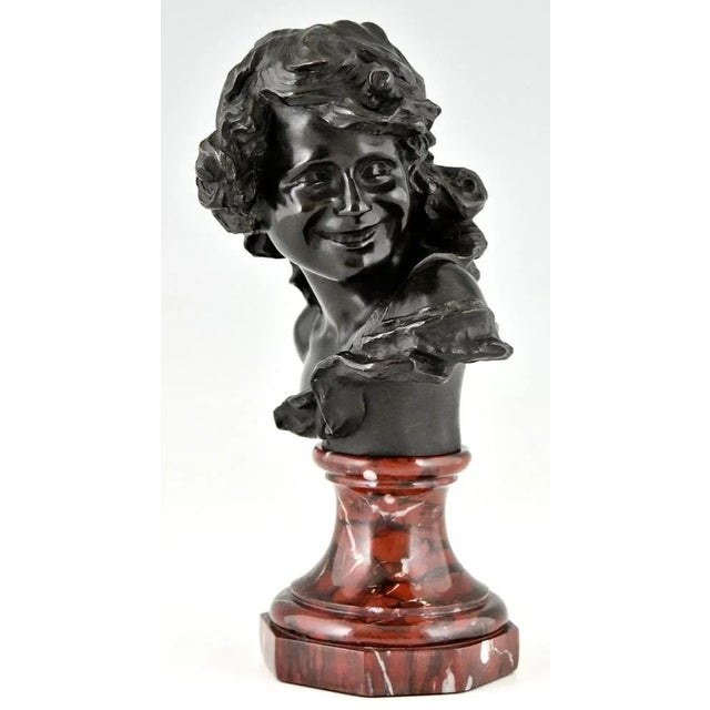 Antique bronze bust of a smiling child by Jean Antoine Injalbert. Foundry mark Siot Decauville Paris, Numbered. France...