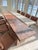 Infinity Travertino Chiaro and Travertino rosso Honed Unfilled Dining Tables Cross-Cut. Fits 8 people comfortably. Each...