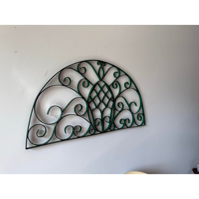 Fun vintage pineapple scroll iron wall grille, well made and distinct depiction easily seen from any angle. Quintessential...