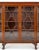 Impressive mahogany Chippendale style 4 door breakfront bookcase. This quality 4 door bookcase stands upon a squat...