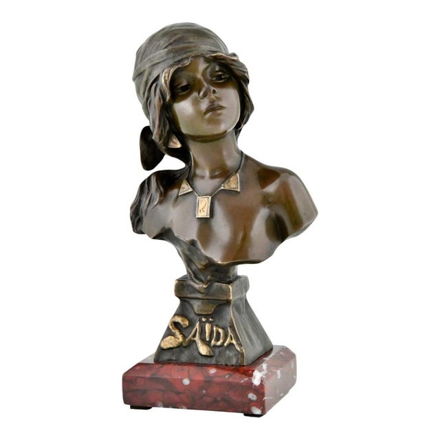 An elegant and highly decorative art nouveau bronze bust titled ‘saïda’, created by the celebrated french sculptor...