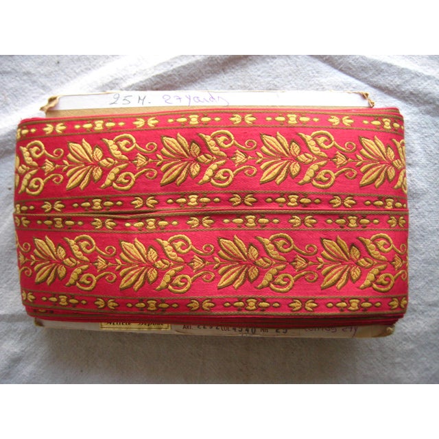 This 27 yard trim never used is in one piece and present a classic Empire Napoleon III style with a rich gold motif on a...