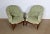 Two "toad" armchairs in solid walnut covered with a padded tapestry in perfect condition. These seats have a prolonged...