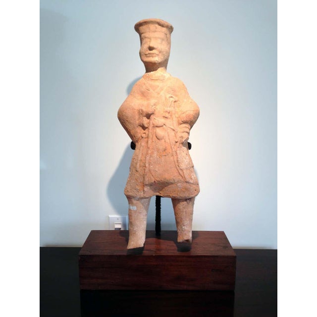 A Chinese terracotta tomb figure (Ni Yong) from East Han Dynasty (25-220 AD), likely from the area of nowadays Sichuan. It...