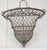 An unusual mid 19th century French wire hanging planter. It is in classic Napoleon III style and retains remnants of its...