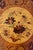 The inlaid wood elements on the top of this table are amazing! One cartouche features a bird (refer to picture 3), and...