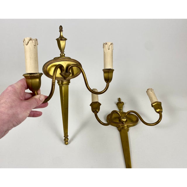 Antique Paired wall sconces in beautiful gilt bronze from the French manufacturer, 1930s. Double arm bronze candlestick...