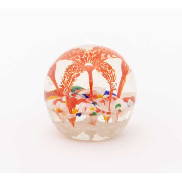 Collection of Six French, Scottish, and Murano Glass Paperweights, including: one with clair de lune blue and yellow...