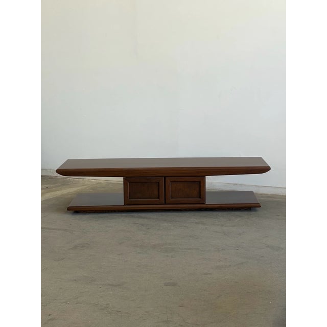 W67 D21 H15.5 This vintage 1960s coffee table has been fully refinished to showcase its warm walnut grain and clean mid-...