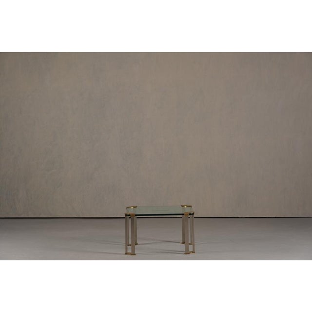 A refined square coffee table designed by Peter Ghyczy in Germany during the 1970s. This elegant piece reflects Ghyczy’s...