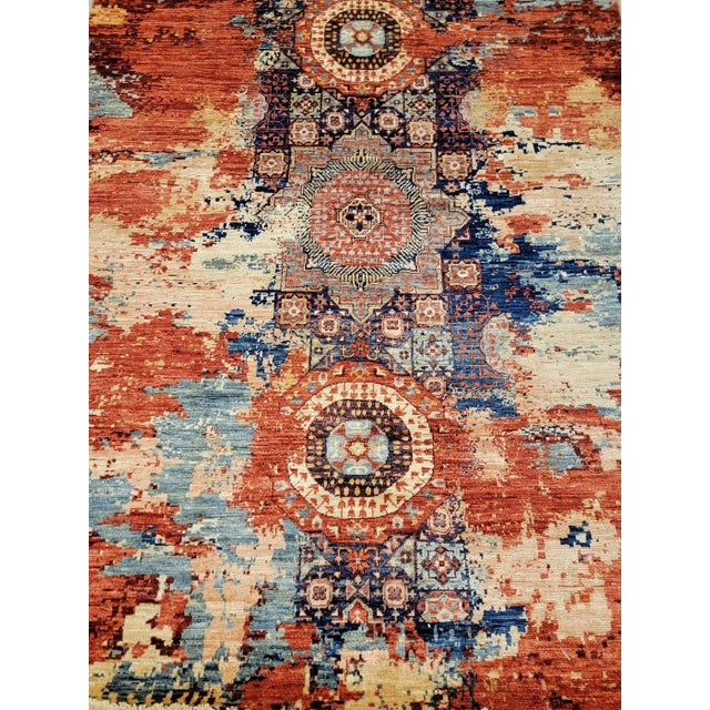 This particular rug is Hand knotted of top quality wool and cotton. It's originally Turkman design, but it reproduced in...