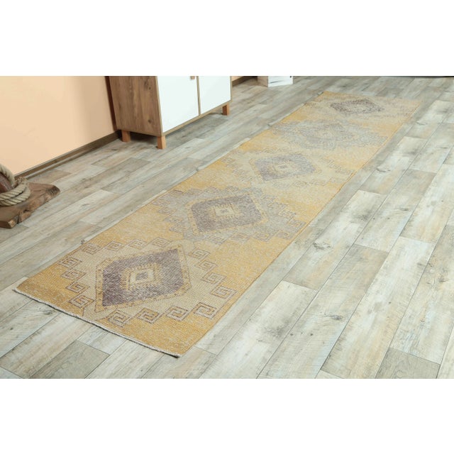 Vintage Turkish Hand-Knotted Runner Rug is a semi-Vintage runner rug. '70s Eastern region of Turkey's unique rug is...