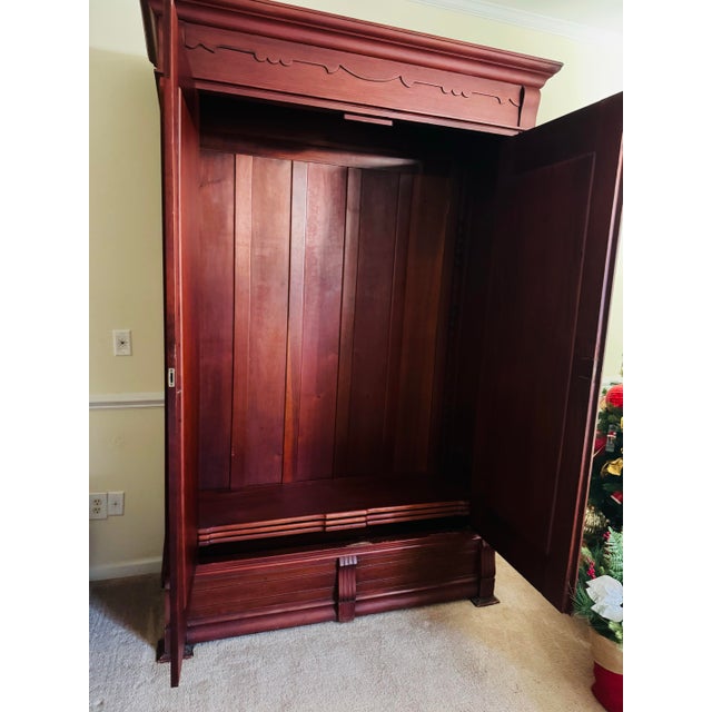 Early 20th-century antique armoire handcrafted from solid Caoba (true Mahogany), verified by a wood expert. The piece...
