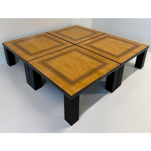 Refined set of four modular coffee tables from the 1980s, crafted in ash burl, decorative inlay in various wood essences,...