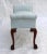 Stunning window/foot of bed bench with carved mahogany ball and claw feet with blue and white piped upholstery seat. I...