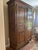 Substantial French Provincial oak armoire in the Normandy tradition, sourced and sold by Baltimore’s renowned Gaines...