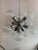 Kalmar Atomic Aluminum Chandelier. Round lightbulbs make the fixture anything you want it to be! white, clear or even...