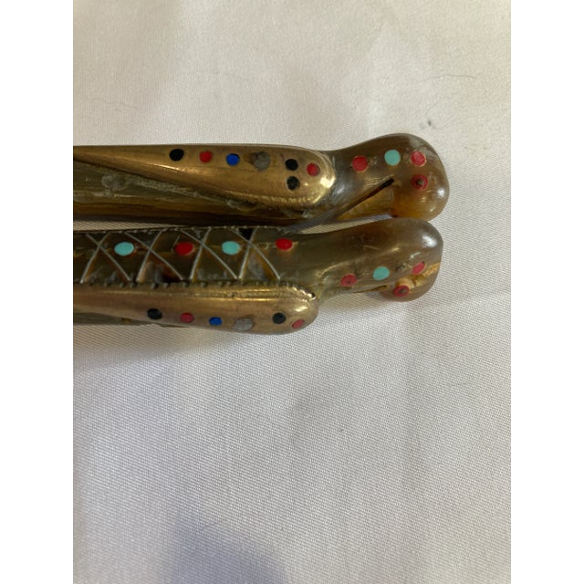 Unique set of 3 knife, spoon, and fork with parrot heads.