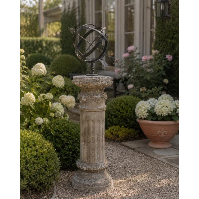 A substantial late-20th-century garden pedestal cast in concrete and modeled after a classical architectural column. The...