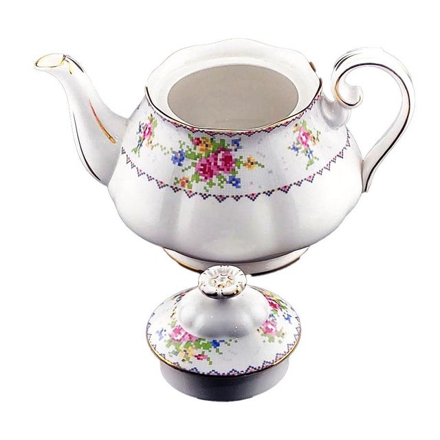 The Royal Albert Teapot Petit Point is a elegant and delicate tea pot made by the renowned brand Royal Albert. Featuring...