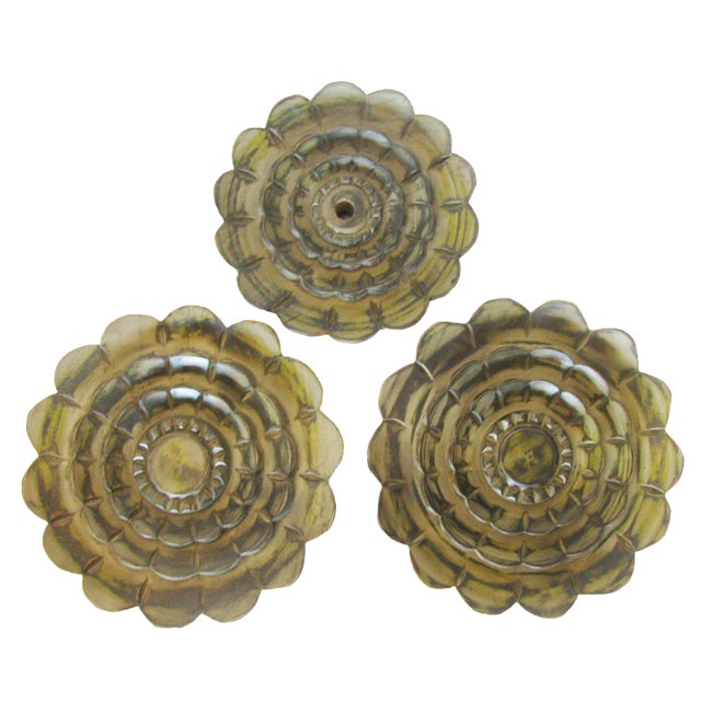 Trio of hand carved wood elements with a floral motif and green finish. Perfect for bookcase or wall display. Inset...