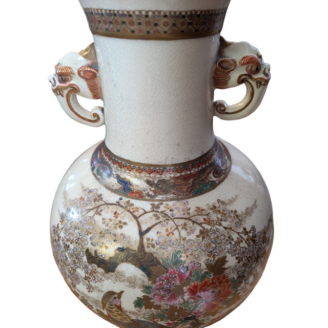 Detailed and unique Satsuma vase from the Meiji period (1868–1912). This stunning antique pottery vase features a rich and...