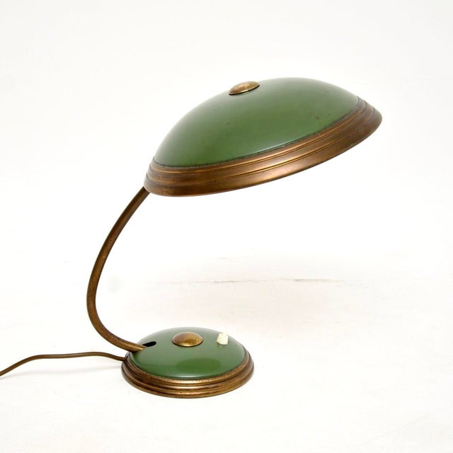 A very stylish and extremely well made vintage Bauhaus enamel and brass desk lamp by Helo Leuchten. This was made in...
