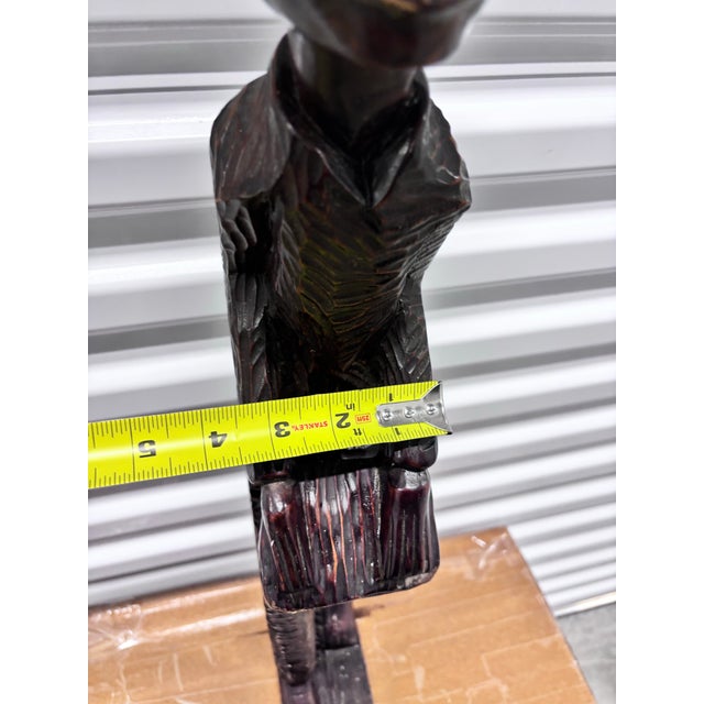 Vintage Hand-Carved Wooden African Tribal Figurine Depicting a Man Playing a Drum, Crafted From Dense Hardwoods Like Ebony For Sale - Image 4 of 12
