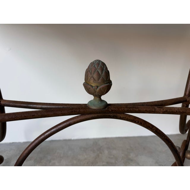 Exuding timeless elegance and sculptural charm, this 1960’s French Hollywood Regency dining table features a beautifully...