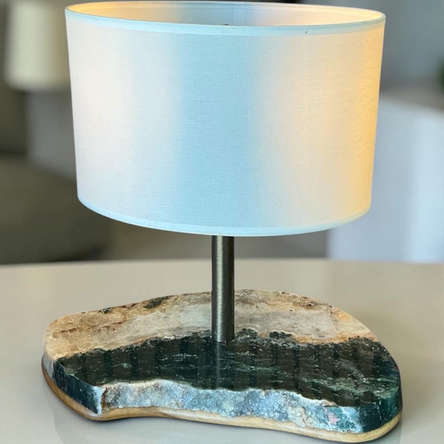A statement of organic luxury, the Jasper Table Lamp showcases the natural beauty of genuine jasper stone, making each...