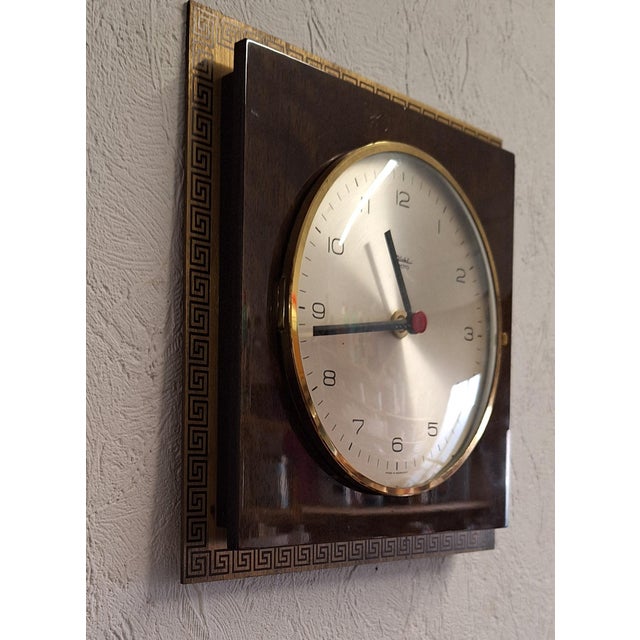 Mid-Century German Wall Clock with Brass Frame and Walnut Case from Diehl, 1960s, in Very Good conditions. Designed 1960...