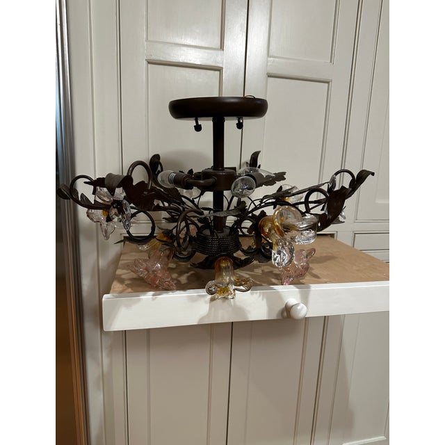 Old Lights On is pleased to offer this vintage oil rubbed bronze flush mount fixture with glass flowers. It is wired and...